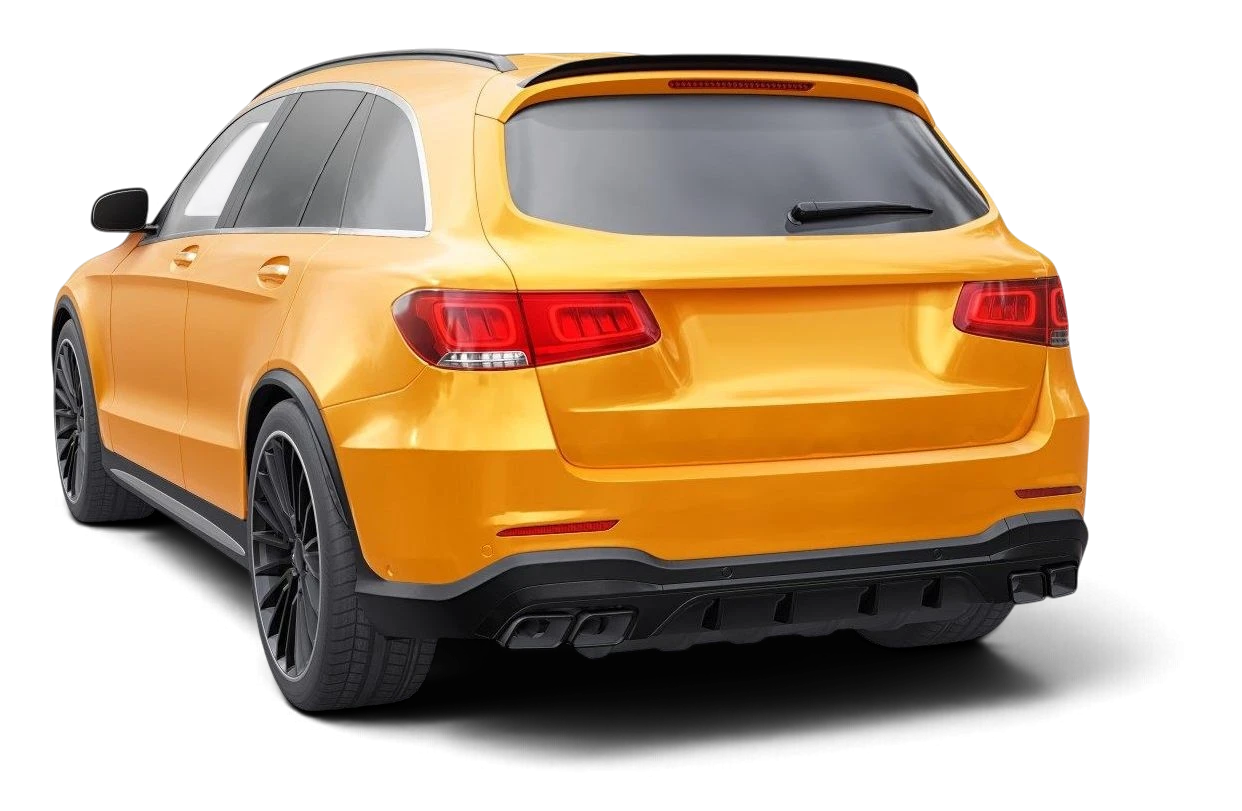 A yellow SUV seen from the rear quarter, ready for the road